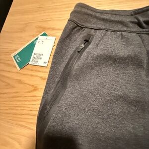 H&M SPORT PANTS WITH SIDE ZIPPER POCKETS AND DRAWSTRING, MED.  GRAY W/BLACK TRIM